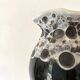 Vintage black and white Savoyard enamel vase