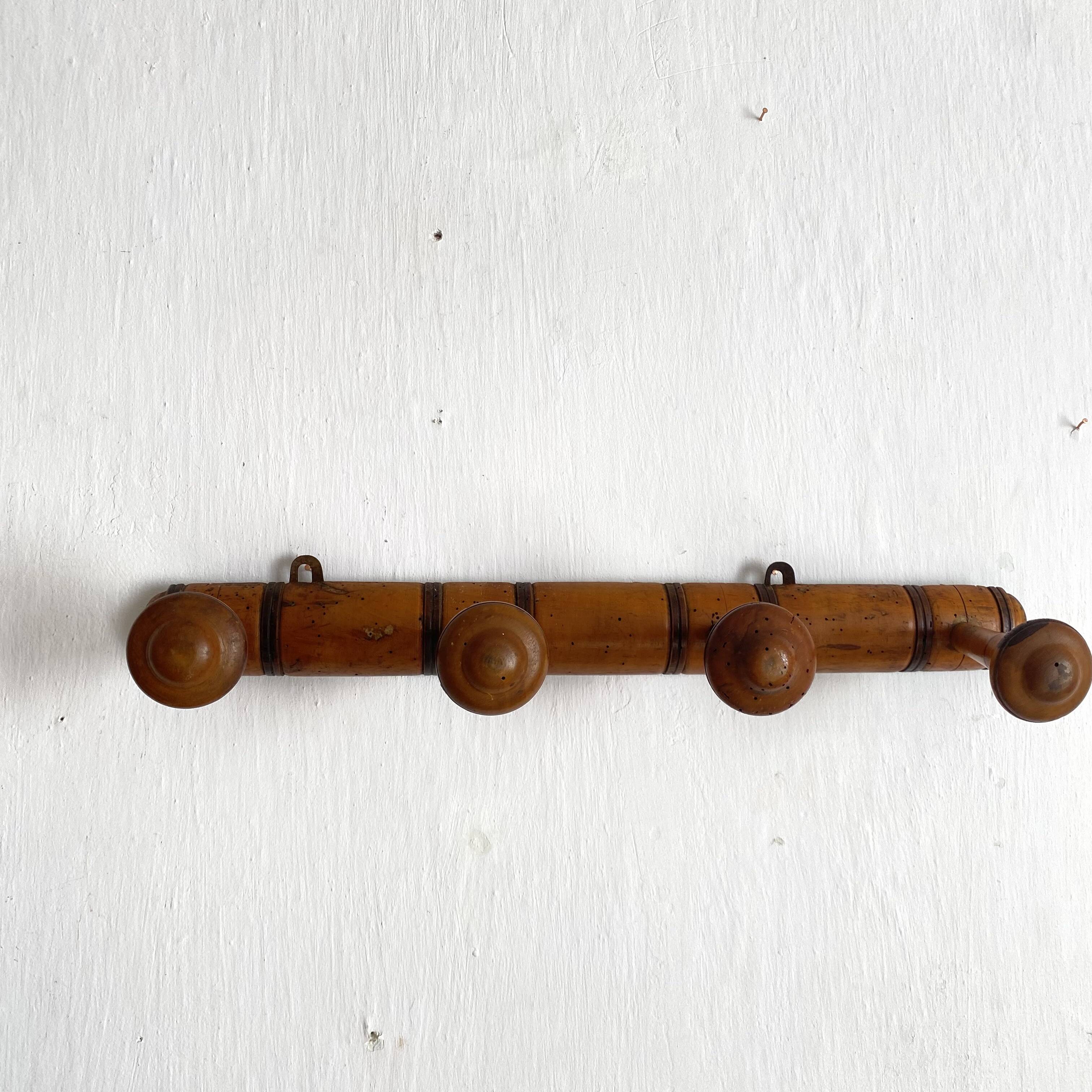 Antique turned wood wall coat rack