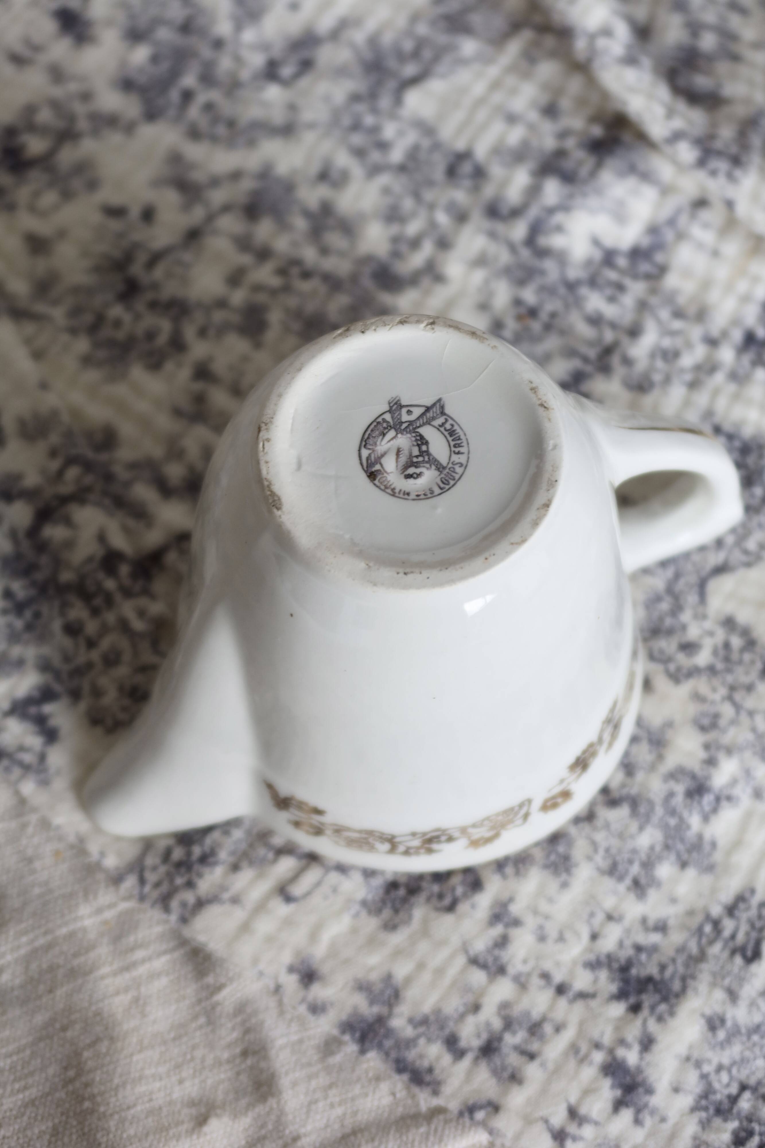 Vintage earthenware milk jug from Moulin des Loups – Gold floral motif