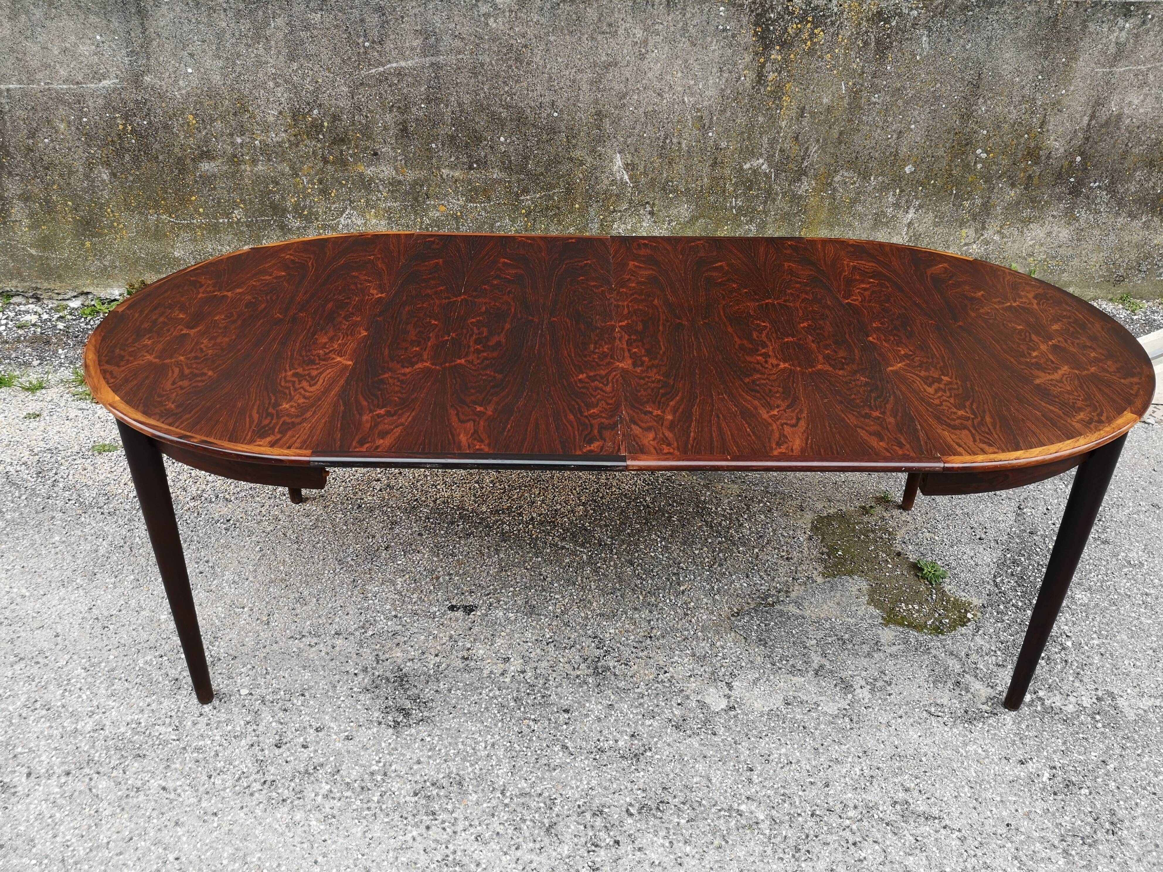 Extended rosewood round table