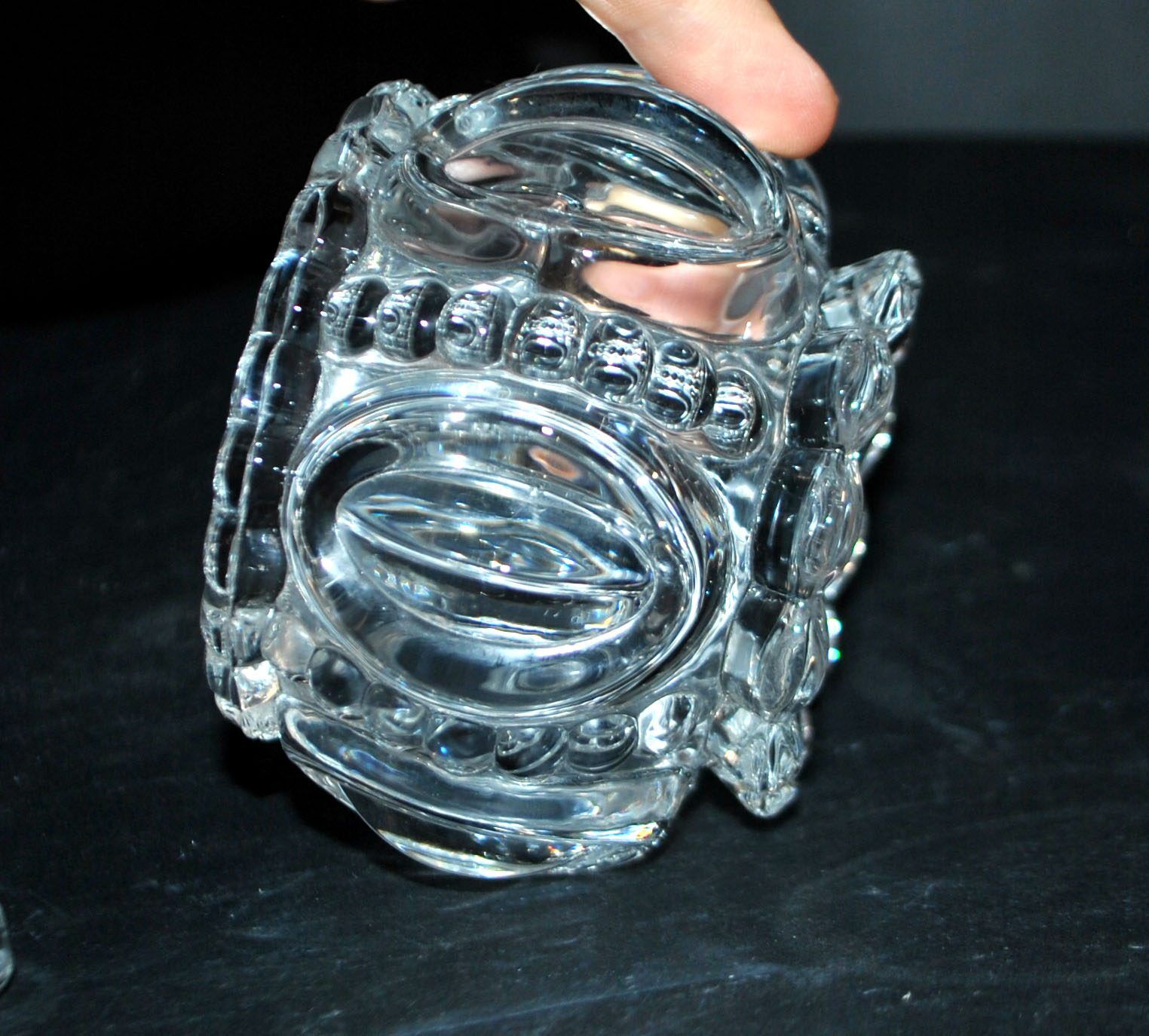 Thick moulded crystal sugar bowl with a beaded and medallion design.