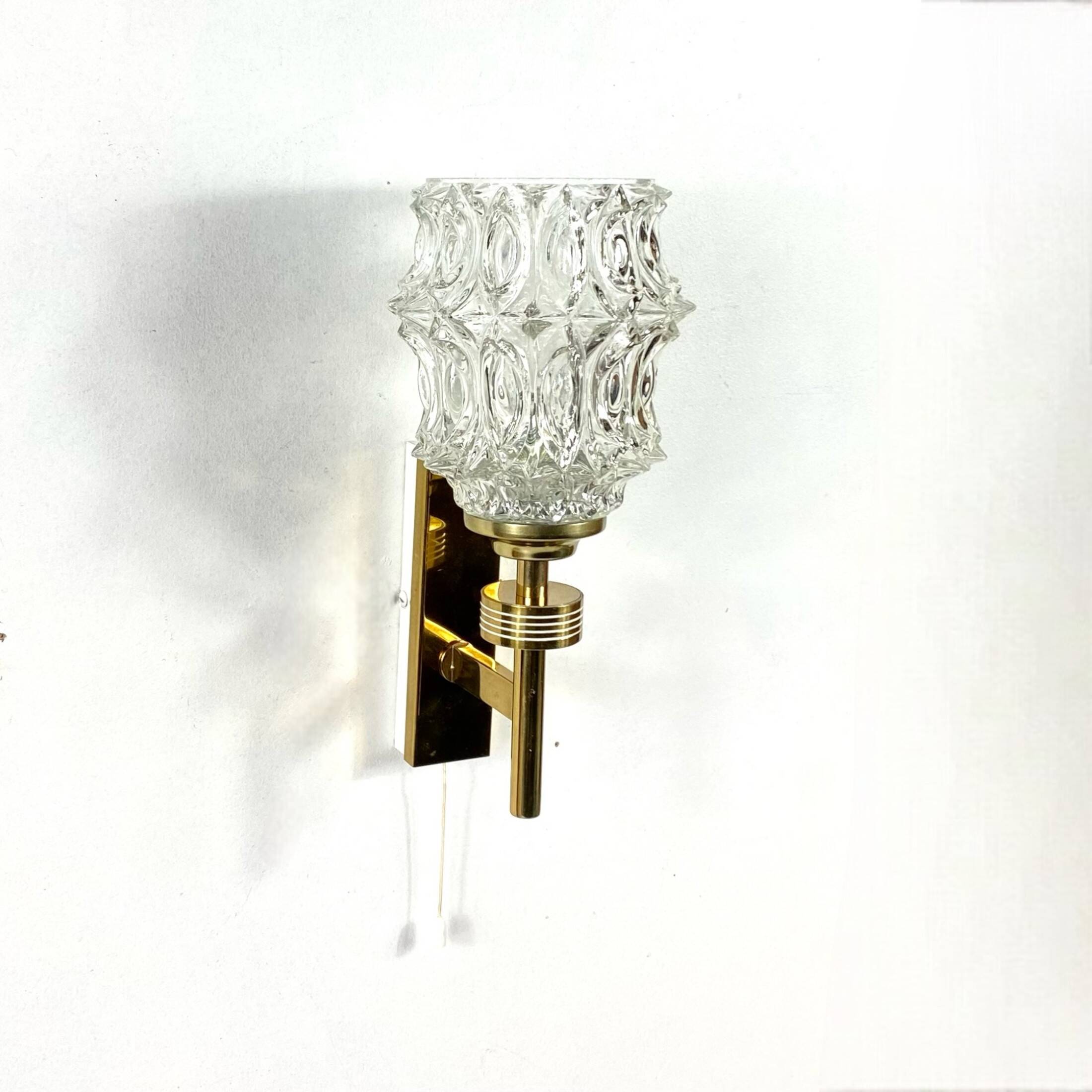 Antique wall light, Arlus type torch, in brass and glass tulip