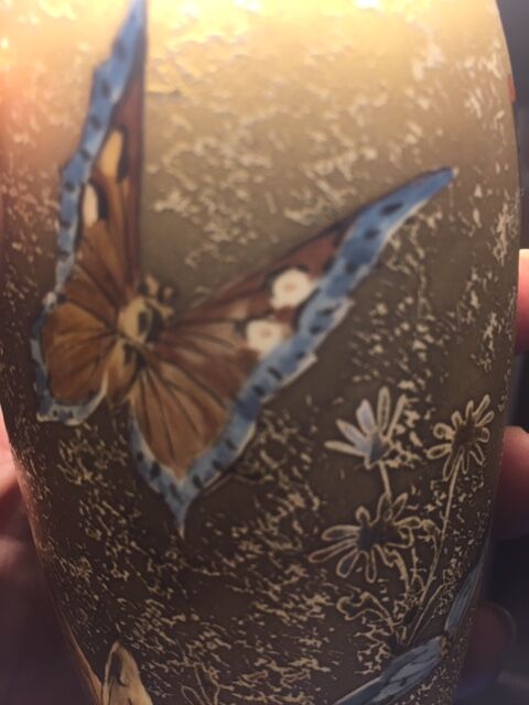 Soliflower with golden butterflies