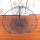 Old foldable blue metal basket, vintage handles