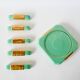 set of coasters and knife holders in mint green and gold art deco ceramic 1930