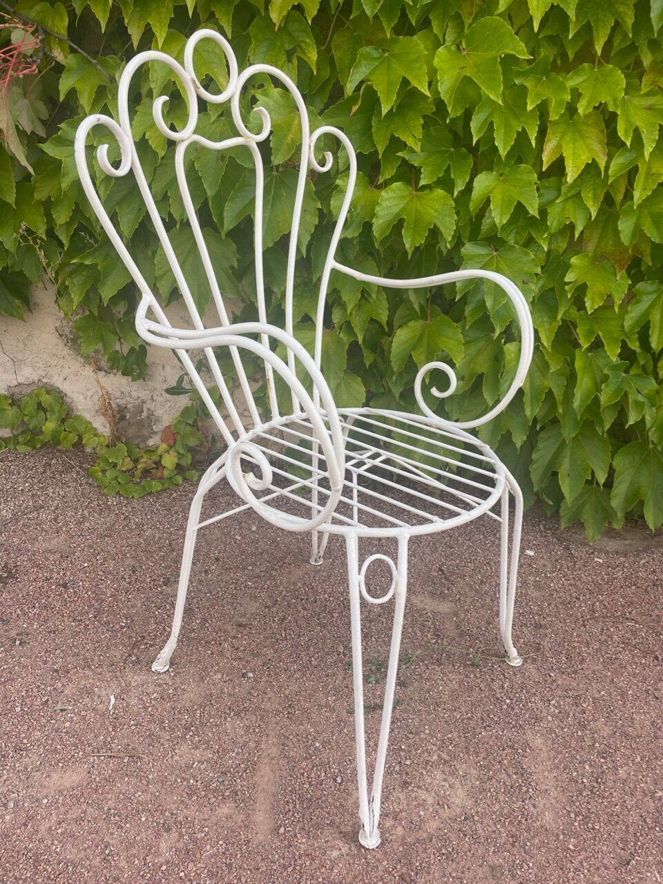 Provençal wrought iron armchairs