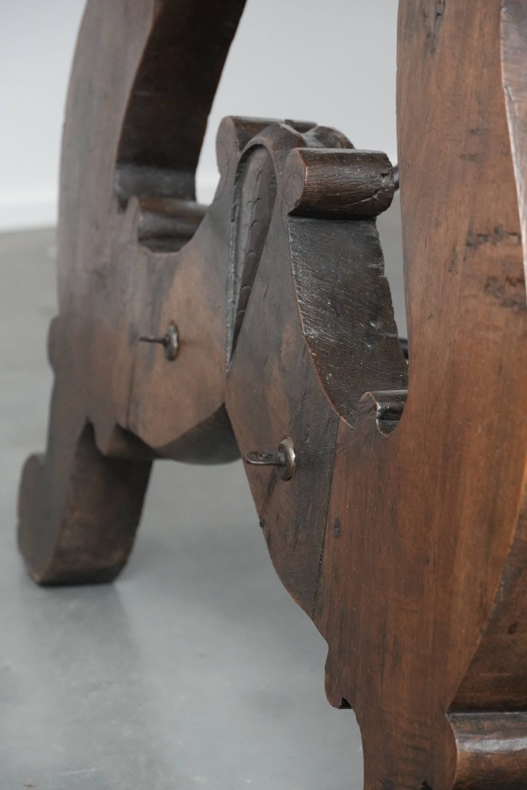 Antique 18th-century Spanish dining table with a wrought iron base