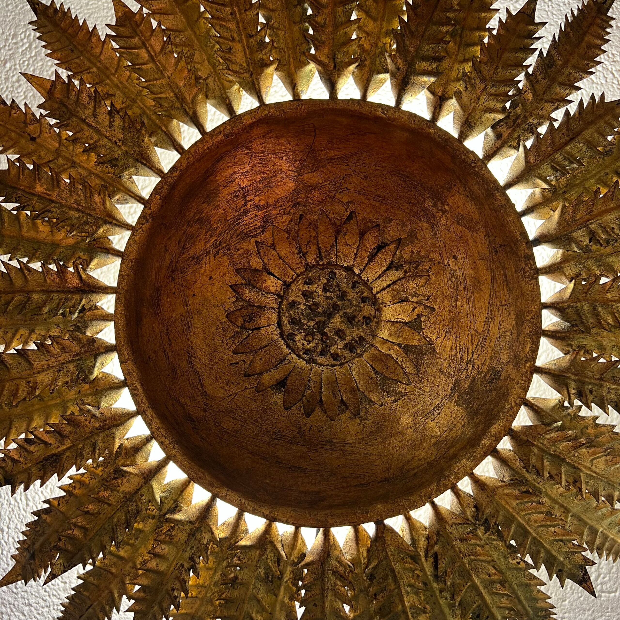 Large wall sconce "Sol" in gilded wrought iron – Spain, 1950s