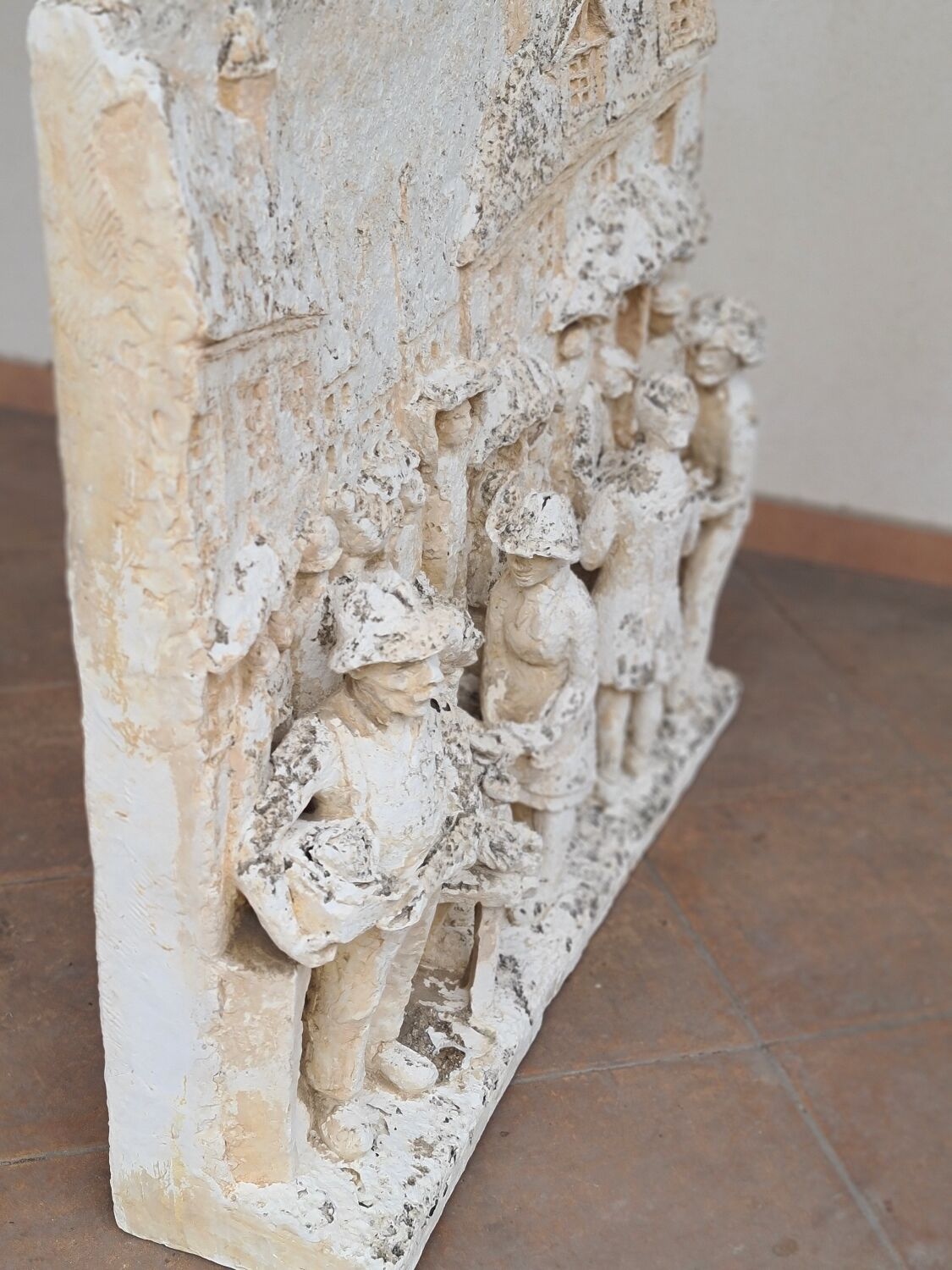 High relief plaster plaque