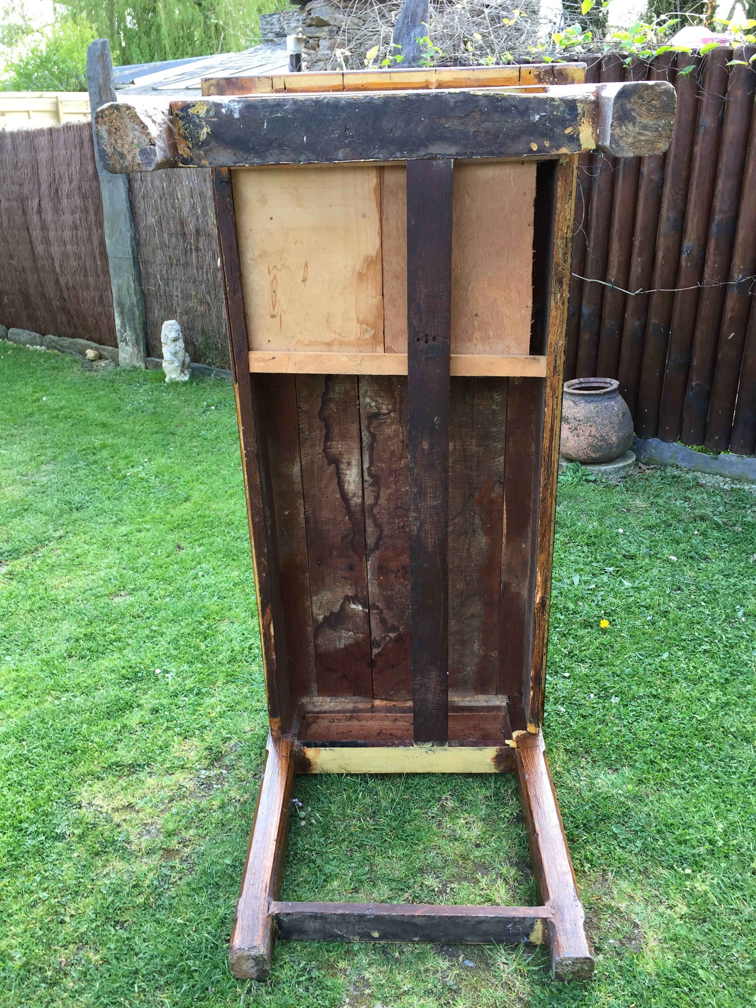 Old farmhouse table in oak painted faux wood old painting.