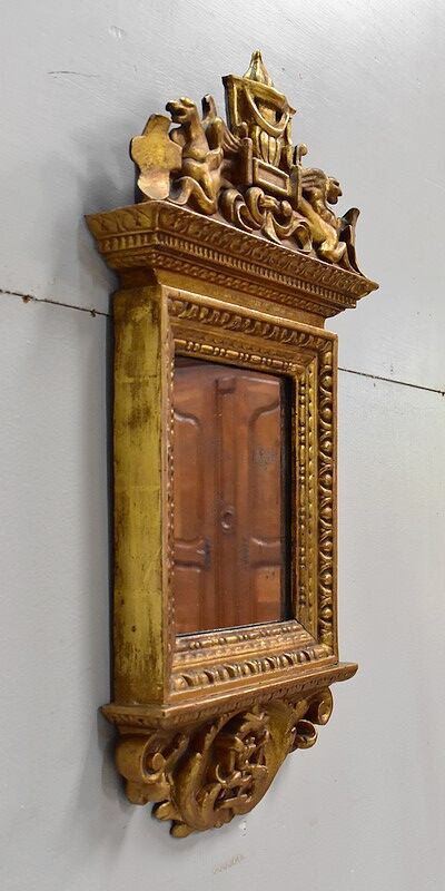 Golden Wooden Mirror with Winged Animal Decorations - Late 19th Century