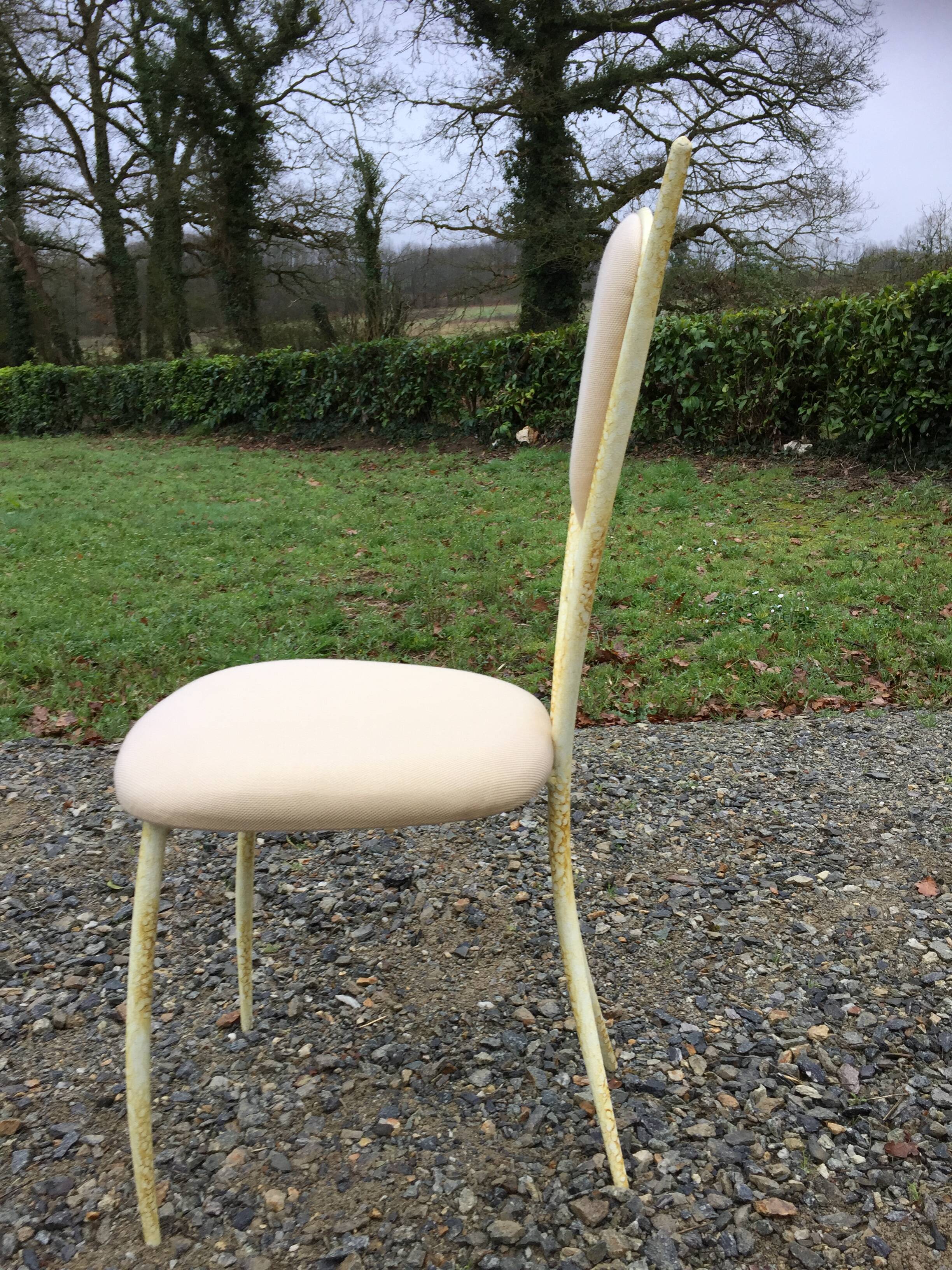 4 vintage chairs in tubular metal lacquered white yellow.