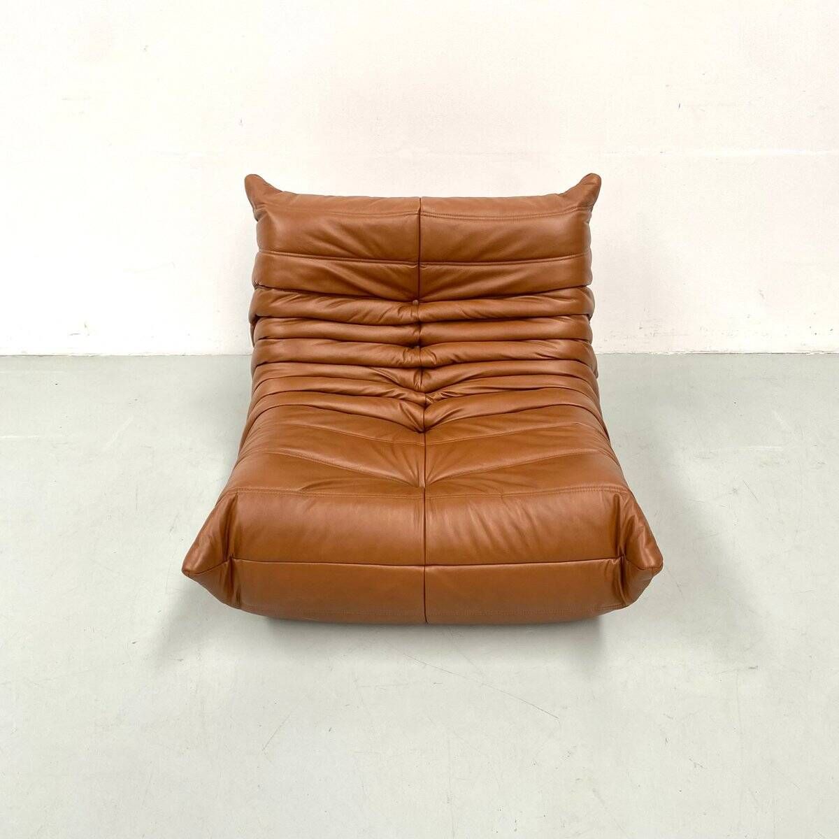 Togo lounge chair in dark cognac leather attributed to Michel Ducaroy for Ligne Roset