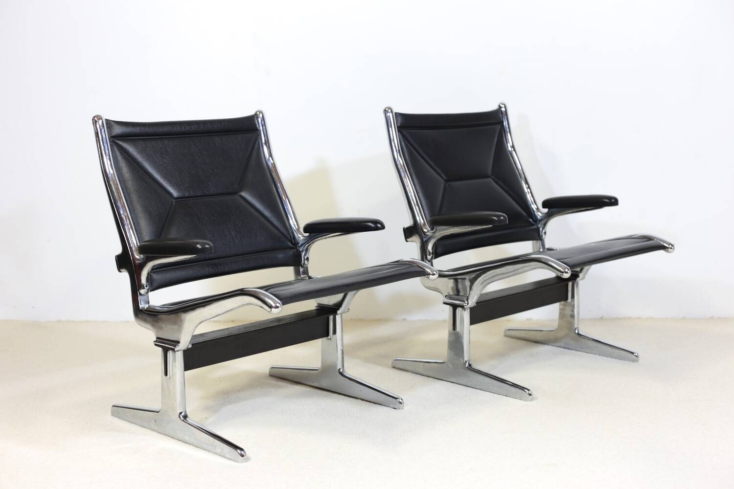 Pair of Eames Sling Tandem armchairs