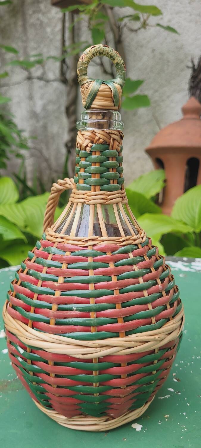 Glass and rattan carafe