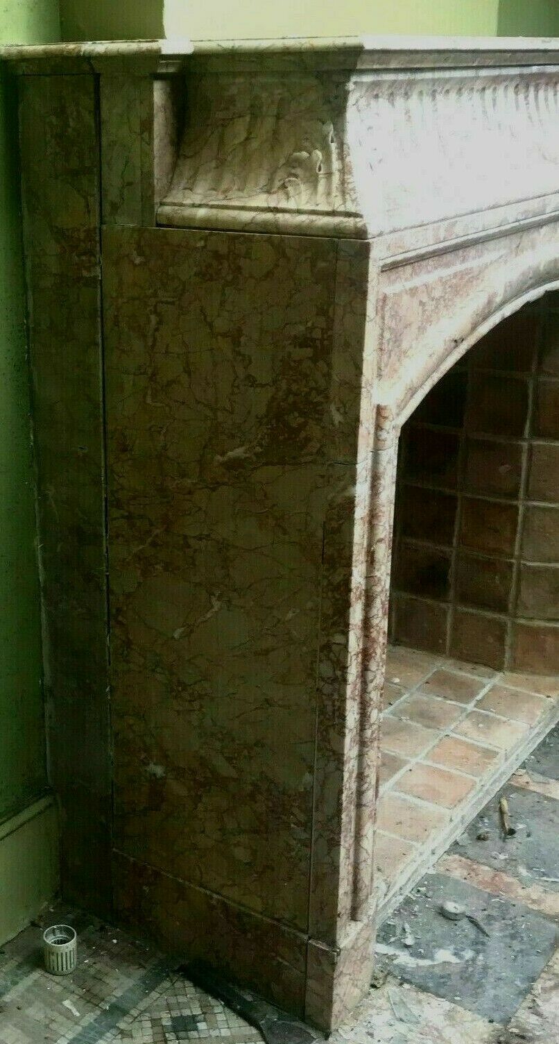 Louis XIV-style fireplace has 19th century veined pink marble hood
