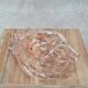 Vintage pink glass catchall / ashtray, hands joined.