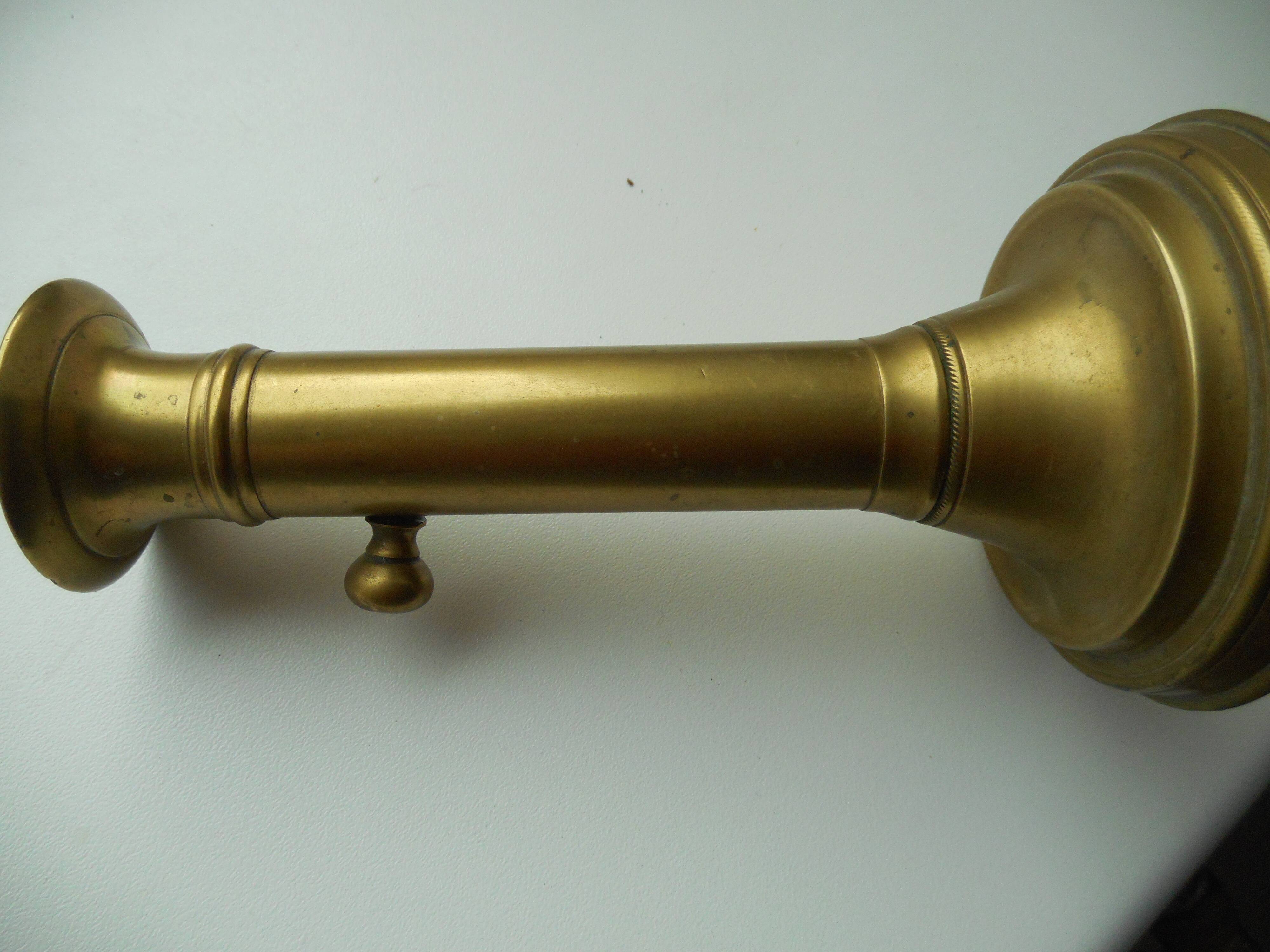 Old brass pusher