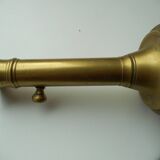 Old brass pusher