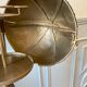 Atypical industrial furniture riveted sphere