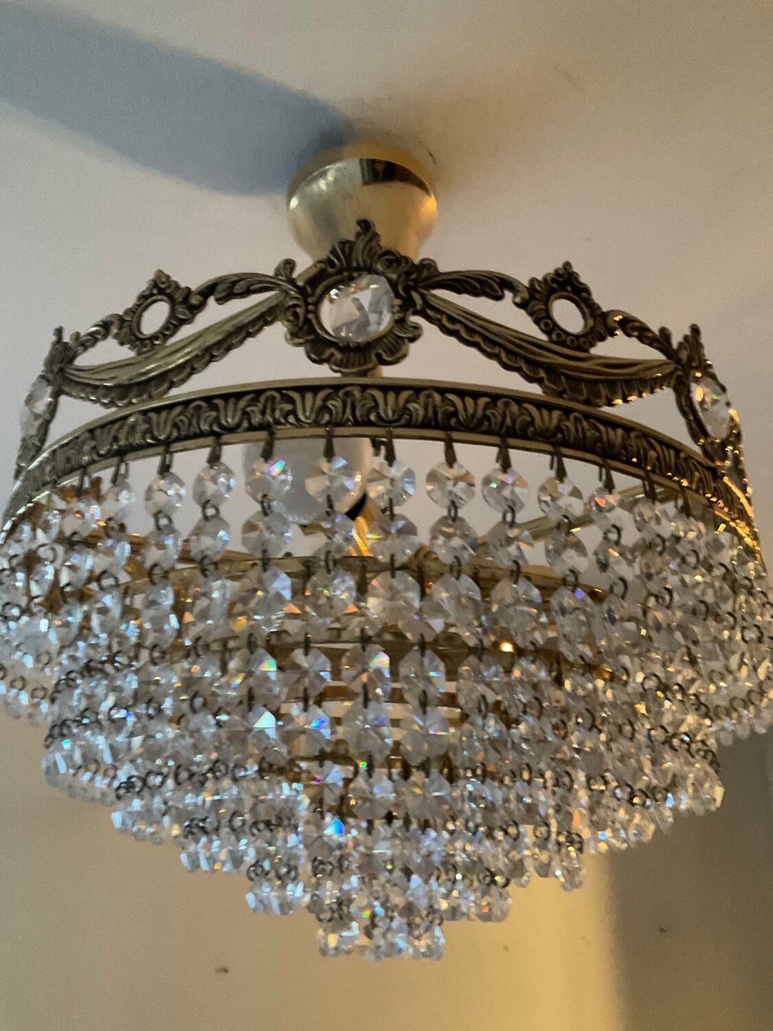 Vintage chandelier cascade of crystal and brass tassels