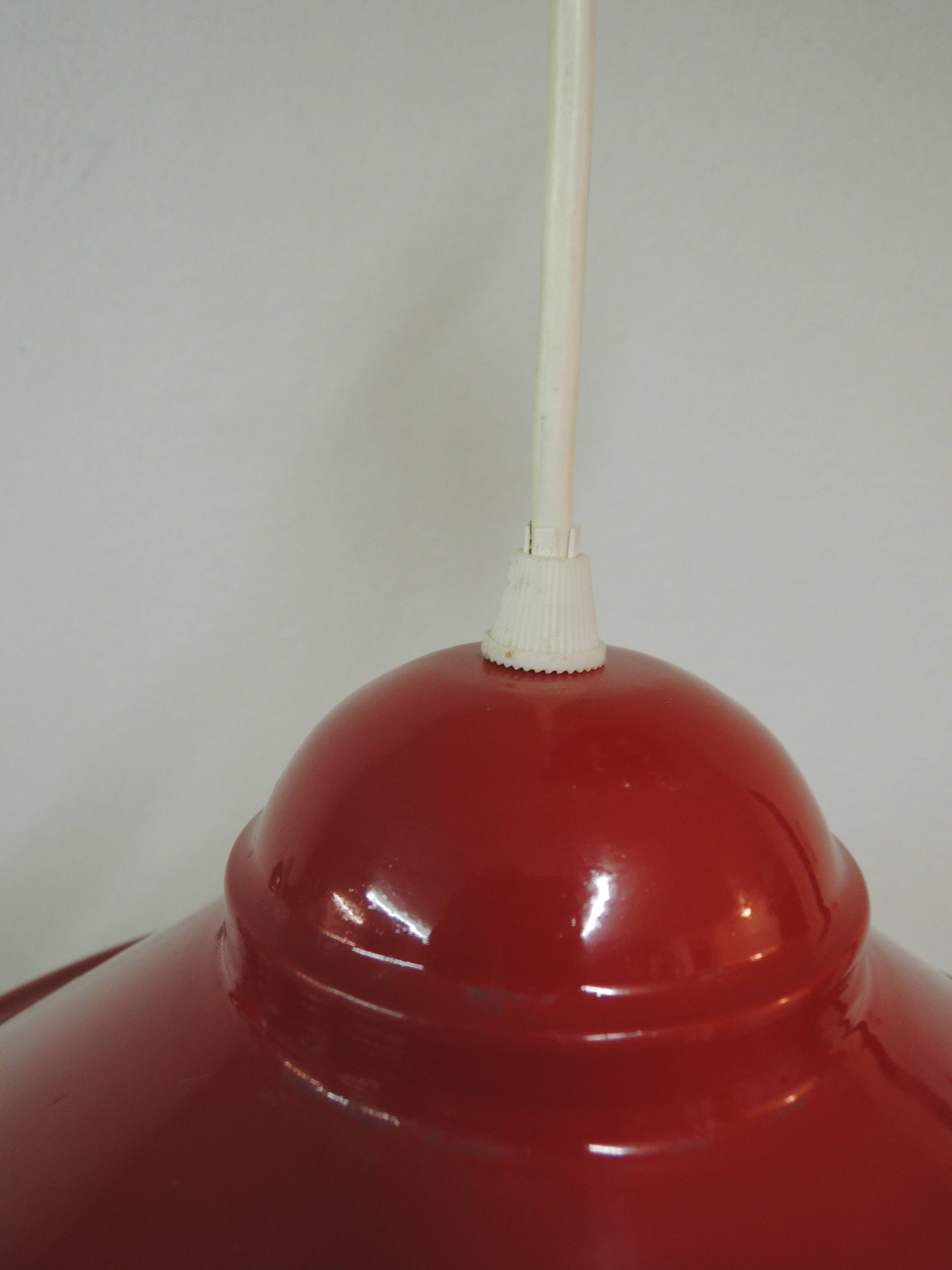 Red metal suspension rises and lowers.