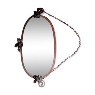 Miroir ovale Art deco roses de fer noir