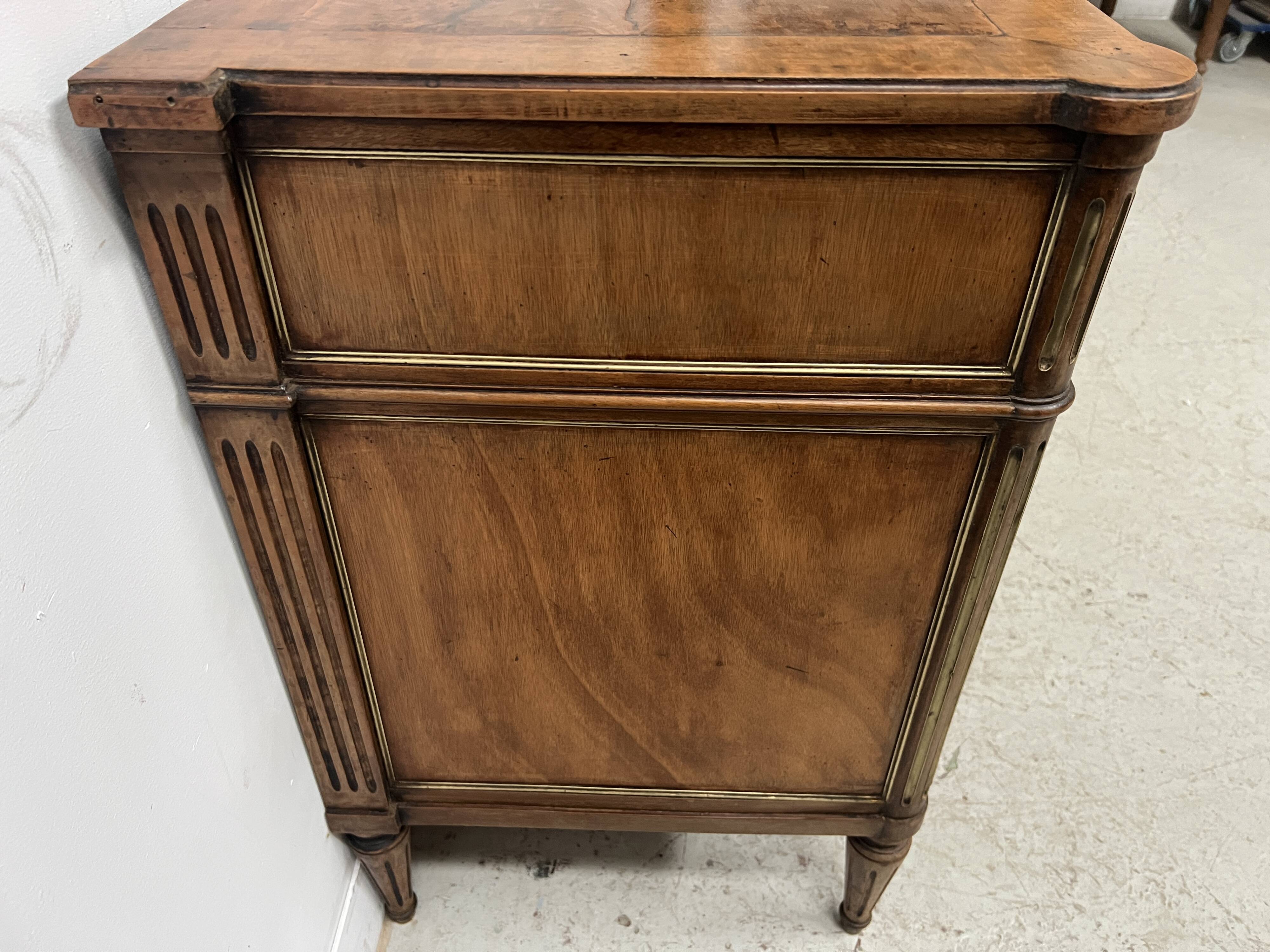 Louis XVI style mahogany commode with a grey veined marble top, 19th century