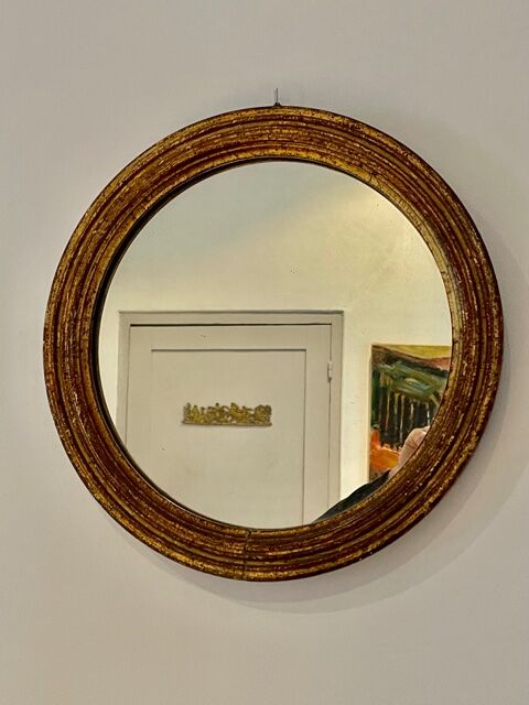 Old mirror in gilded wood early twentieth century