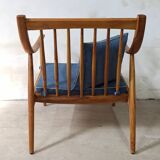 Paire de fauteuils cosy en teck avec coussins