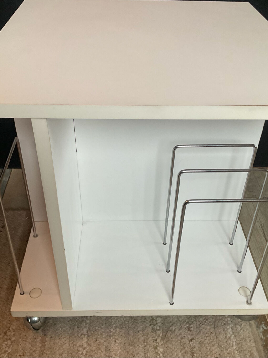 Small side table with storage for vinyl records from the 1970s.