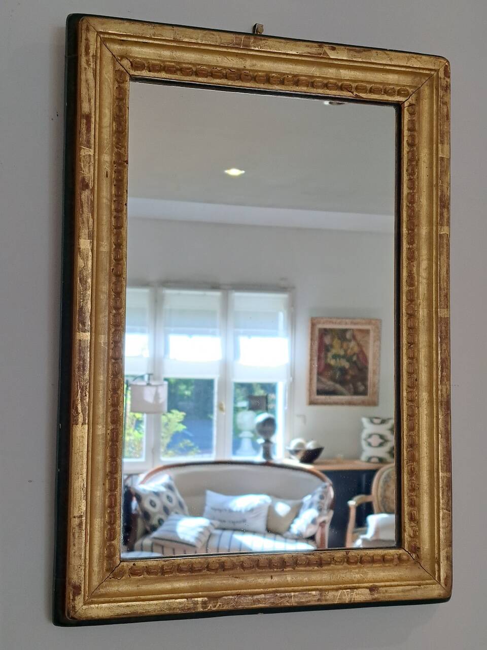 Antique mirror in wood and gilded stucco