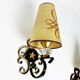 1950 gold star and black metal sconces