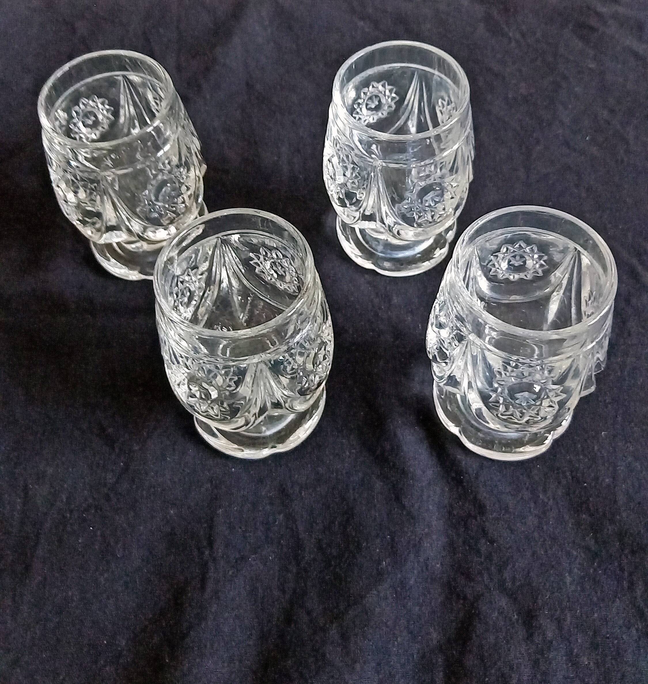 4 antique to digestive glasses in cut crystal and molded crystal decorated