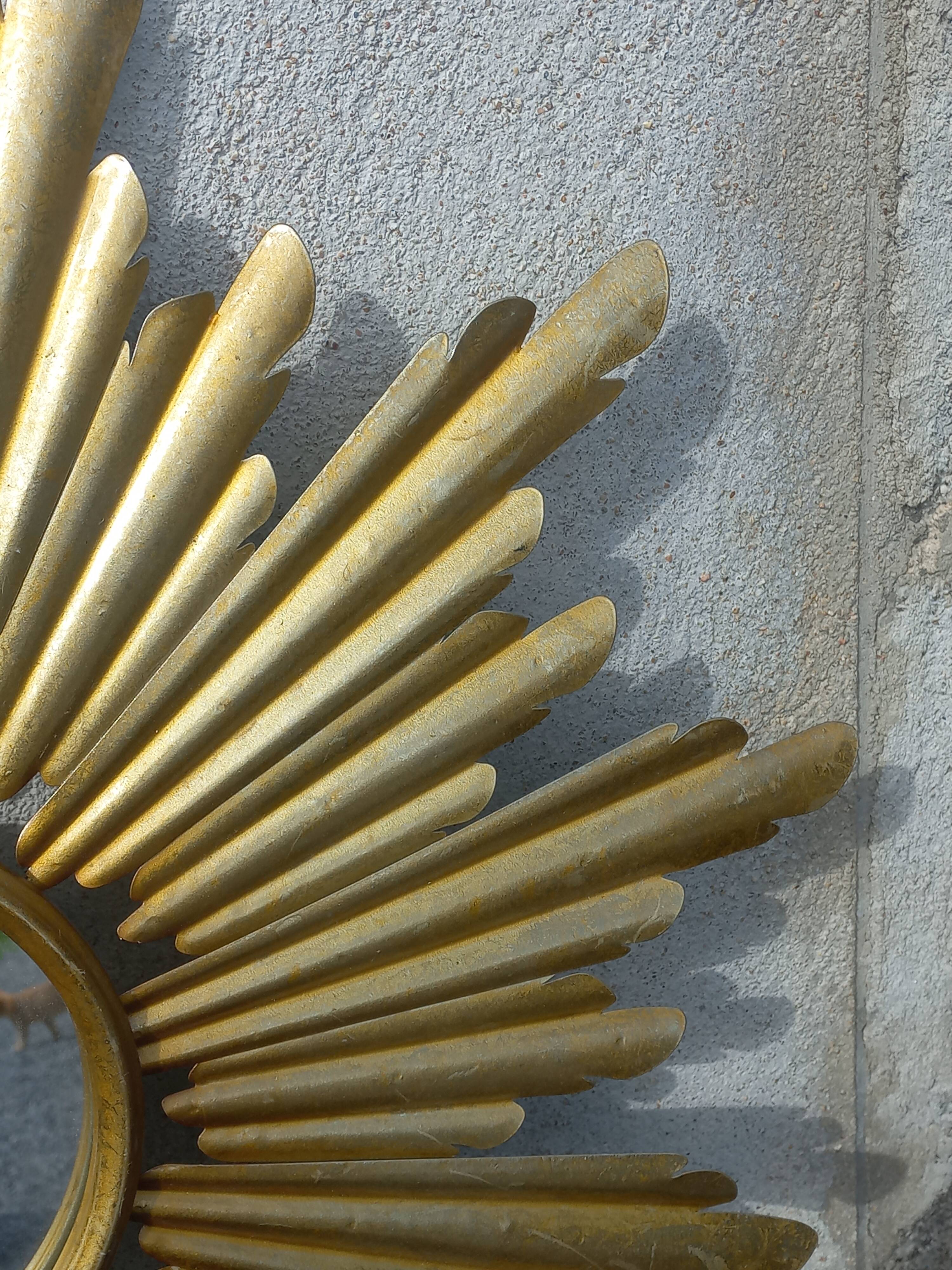 Gold metal sun mirror