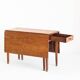 Vintage table with two folding leaves. Solid oak wood. France, 1940s