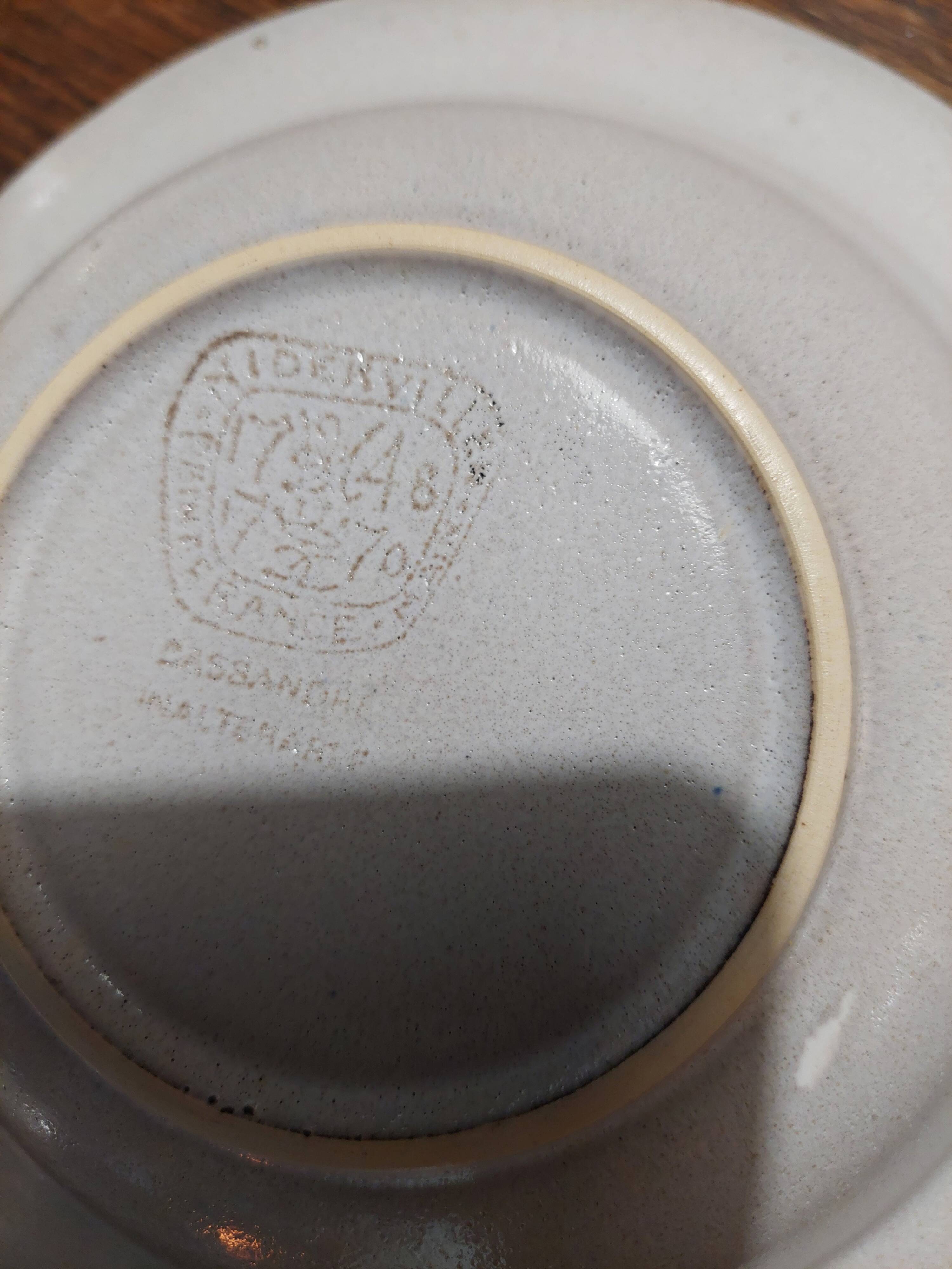 Deep plates series of six Niderviller stoneware, 20th century Cassandre decoration