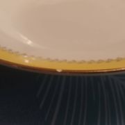 Set of thirteen old porcelain soup plates signed "Biarritz"
