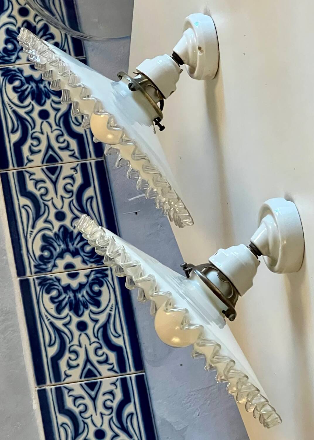 Pair of serrated opaline and porcelain sconces