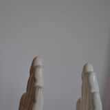 Handends in the shape of vintage white ceramic