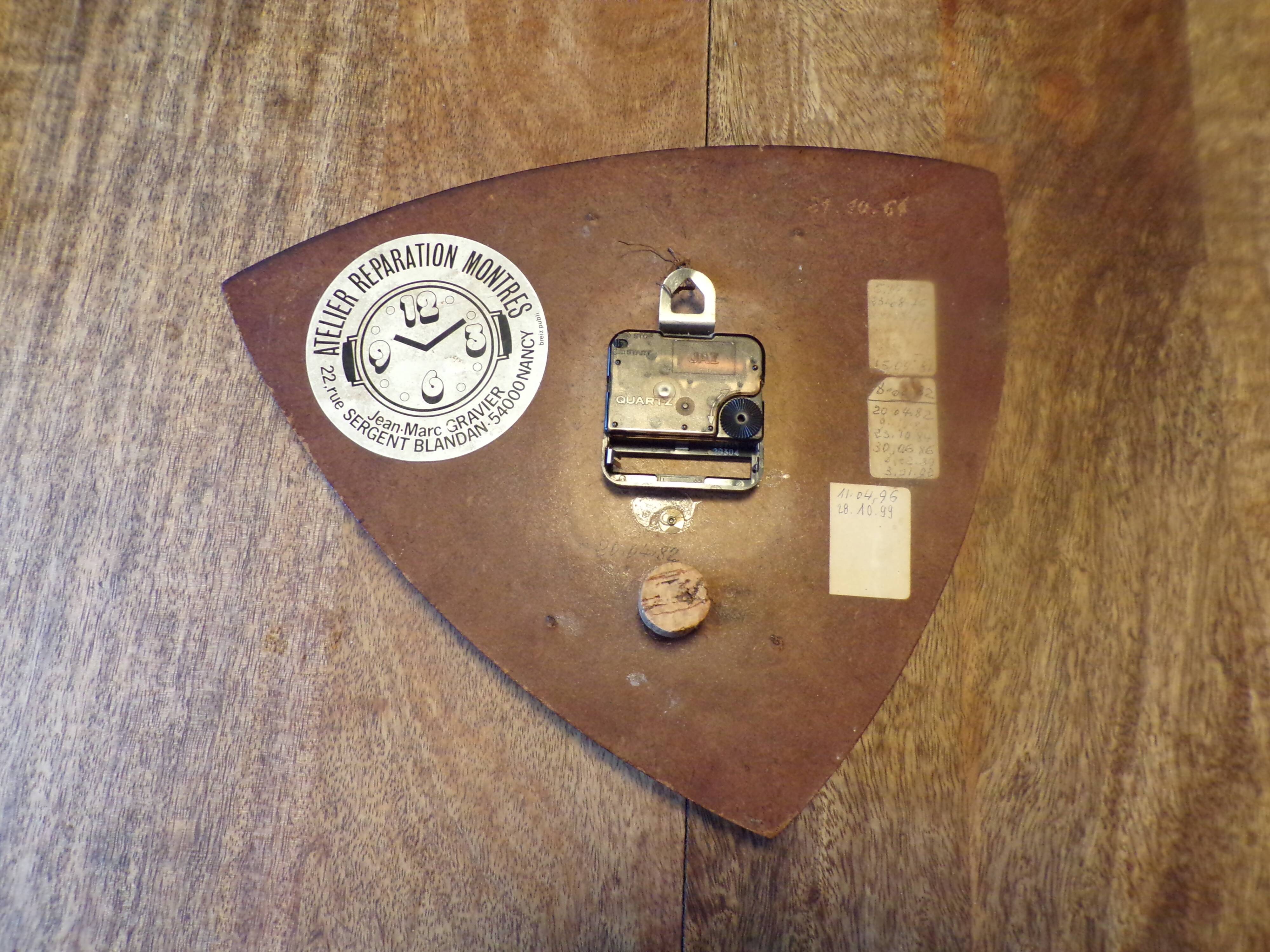Pendule murale vintage en formica