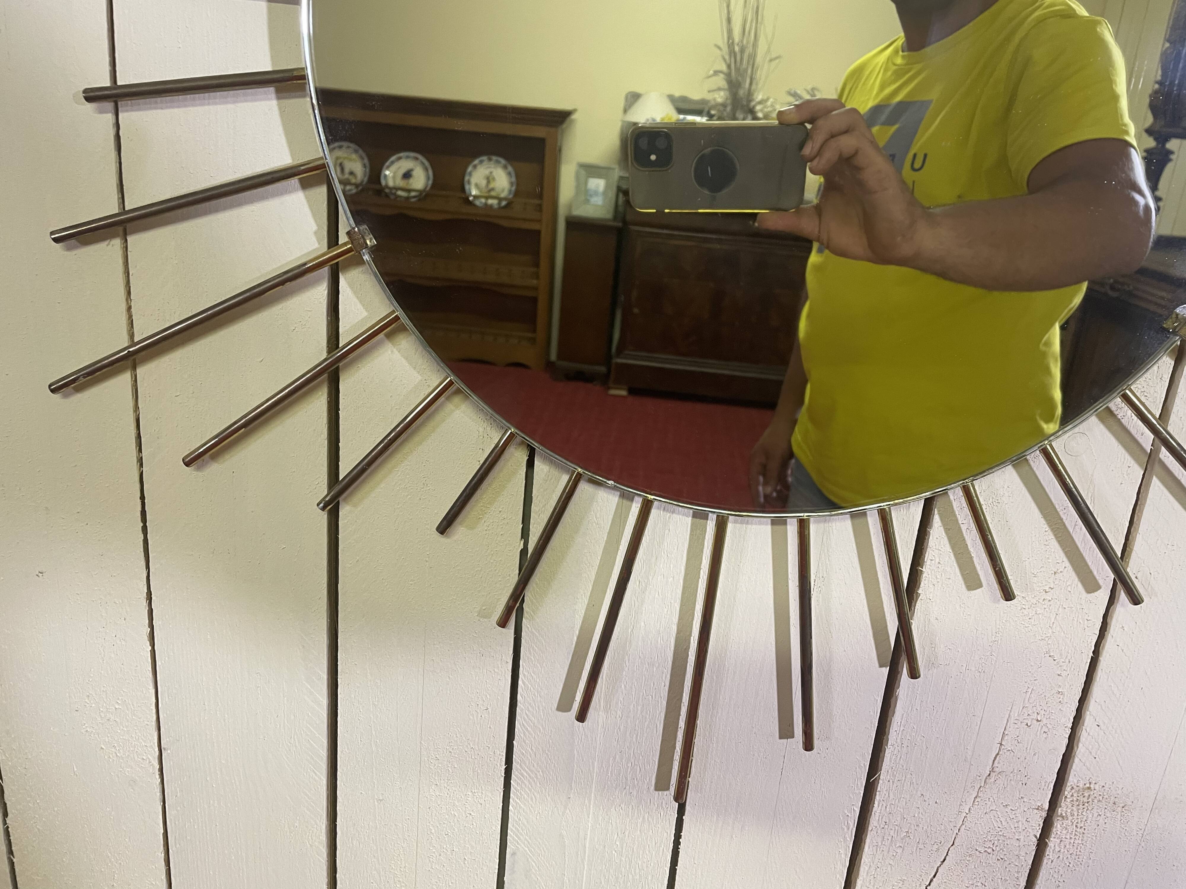 Golden metal sun mirror year 60