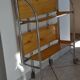 Folding dessert trolley on chrome metal wheels and formica.