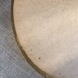 Golden oval mirror