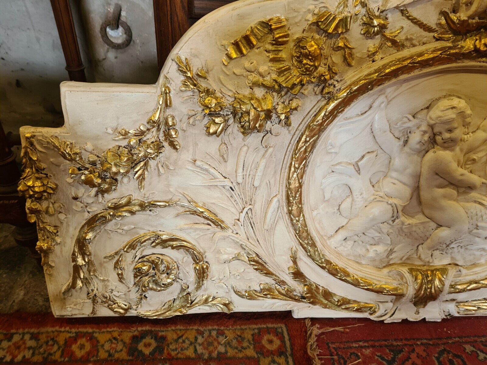 pediment panel with stucco angels