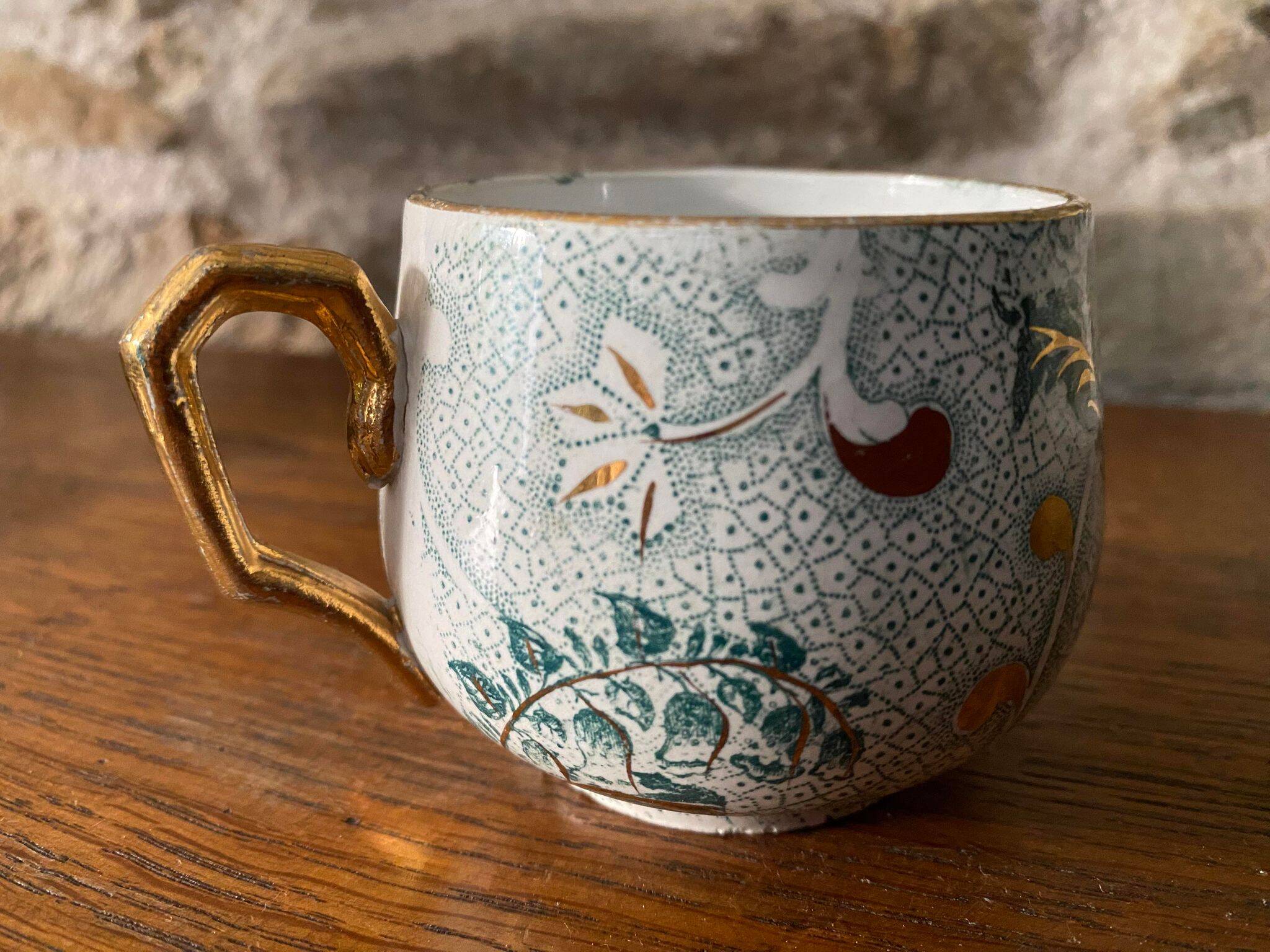 Creil et Montereau cup and saucer green and gold floral pattern