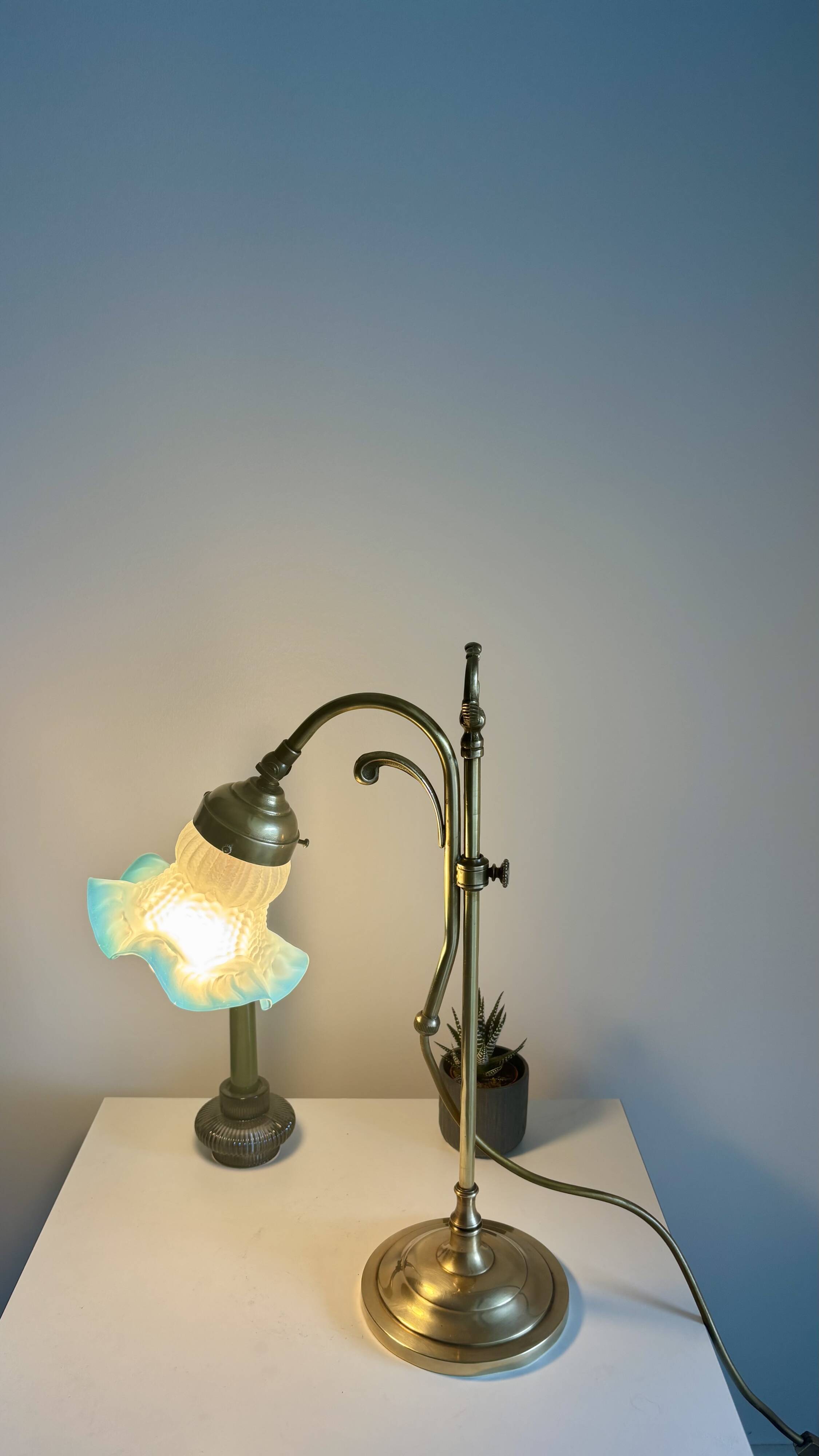 Art Nouveau style gilded brass lamp with sky blue opaline tulip