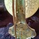 Art deco sconce, golden brass and yellow speckled Clichy glass globe