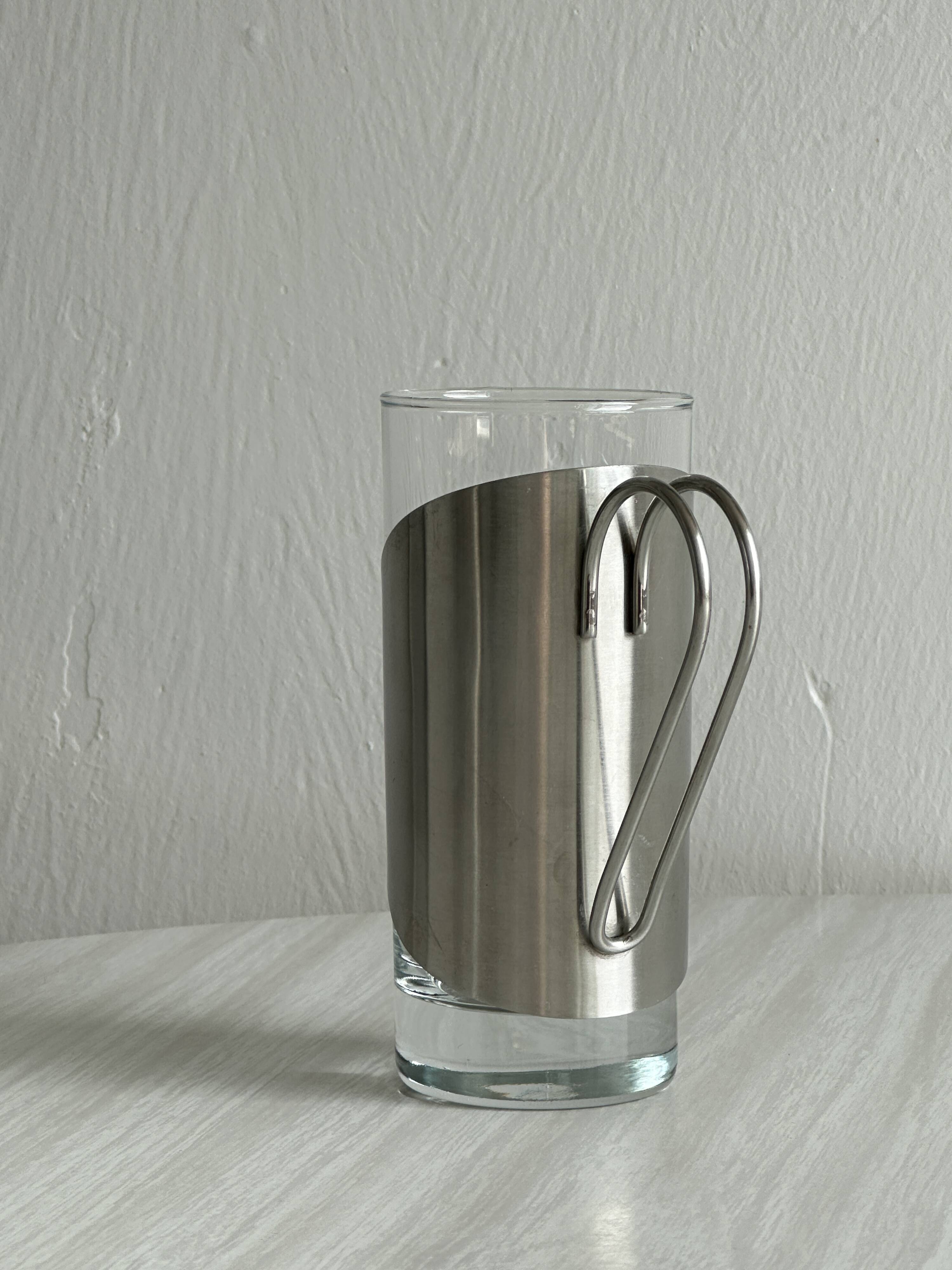 2 glasses with metal handles, stainless steel.
