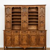 Clockside cabinet from the Louis XV period in walnut and elm, fully carved.
